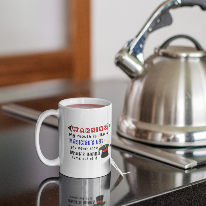 Funny 15oz. White ceramic mug "Warning my mouth is like a Magician's hat you never know What's gonna come out of it". - Funnytwist.com